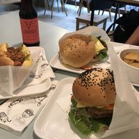 Pastrami Burger, Tempeh Burger, Hot Dog and Potatoes  at Krowarzywa in Wroclaw