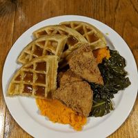 Sweet potato mash, collards, waffles and chicken at The Hogtown Vegan in Toronto