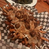 Poutine - deep fried seitan!!   at The Hogtown Vegan in Toronto