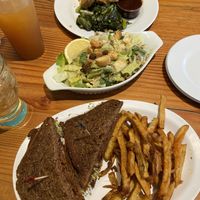 Amazing Caesar salad and Southern combo, vegan Ruben sandwich was just okay. Iced tea on the left is delicious too! at The Hogtown Vegan in Toronto