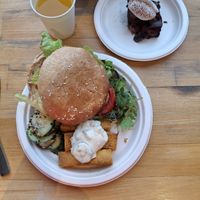 Vegan tofu burger with cornbread fries, salad and brownie! at Bhakti Lounge in Wellington