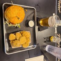 Vegan chicken sandwhich with fried pickles. Medium spice at Flippin' Good in Las Vegas