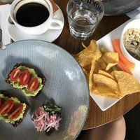 Avo & tomato on toast, hummus served with corn chips & vege sticks  at Moka Bros - K Wah Centre - Maybe closed in Shanghai