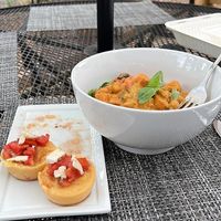 Polenta bruschetta and chickpea curry. So delicious!  at Sun Belly Cafe in Greenville