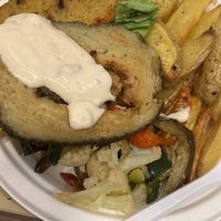 farinata(sotto) seitan(sopra) con mayo ai pomodori secchi.  at Officina Vegana in Naples