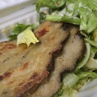 Seitan e insalata di scarola at Officina Vegana in Naples