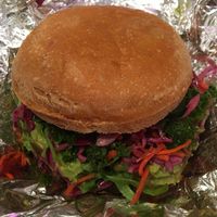 Smoky Beet Burger with avocado on GF bun at Two Tablespoons in Brooklyn