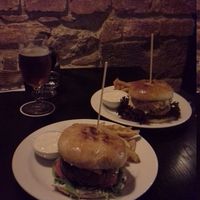 Curry and chilli burgers with fries, vegan mayo, beer and wine. at Tři Ocásci in Brno