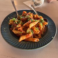 Red sauce pasta, request vegetables added  at Cafe Catamaran in Alappuzha