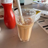 Yellow smoothie  at Cafe Catamaran in Alappuzha