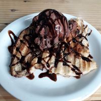 Rabetone (vegan panetone french toast with chocolate ice cream and chocolate syrup) at Viva la Vegan Bike Cafe in Curitiba