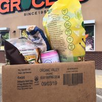 Recycled box instead of plastic bag at Natural Grocers in Topeka