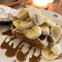 Vegan waffle with cream, speculoos and banana at Charlotte's by De Brugsche Tafel in Bruges