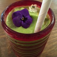 Pina-kale-ada smoothie with coconut water, pineapple, banana, coconut meat, and kale. at a'a Roots Health Cafe in Lahaina