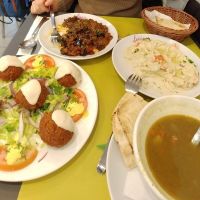 Sopa de lentejas, falafel, musaka, humus y pan de pita at Fenicia Vegetaria in Barcelona