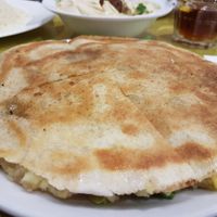 Pita stuffed with spiced potatoes and lettuce at Fenicia Vegetaria in Barcelona