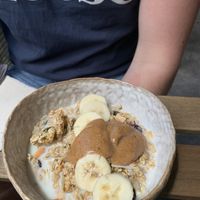 Granola with almond butter, banana and almond flakes at mymuybueno Deli in Mallorca
