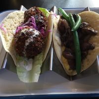 Yemeni Lahuh Bread - Right: Green beans, mushroom ragu, fresh creamed corn. Left: Falafel, tahini, pickles and parsley at Green Man's Arms in Carlton