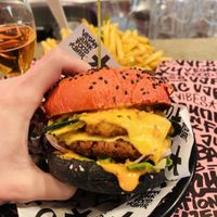 Chicken tenders, beef, cheese, lettuce, sauce, jalapeño slices: it’s a monster   at Vegan Junk Food Bar - De Pijp in Amsterdam