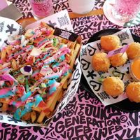 Rainbow fries and mac and cheese balls at Vegan Junk Food Bar - De Pijp in Amsterdam