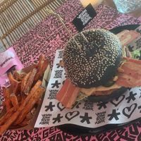 The Royal Smash Burger with sweet potato fries. at Vegan Junk Food Bar - De Pijp in Amsterdam