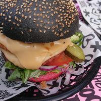 burger with vegan cheese and meaty patty - soo tasty  at Vegan Junk Food Bar - De Pijp in Amsterdam