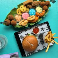 Sumo platter and rib burger  at Vegan Junk Food Bar - De Pijp in Amsterdam