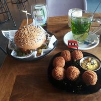 House-style burger, bitterballen and mint tee at Vegan Junk Food Bar - De Pijp in Amsterdam