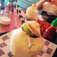 fresh coconut drink at Vegan Junk Food Bar - De Pijp in Amsterdam
