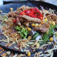 blue tortilla 13 euros at Vegan Junk Food Bar - De Pijp in Amsterdam