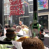 Daddy McChikin and Original Burger with waffle fries  at Vegan Junk Food Bar - De Pijp in Amsterdam