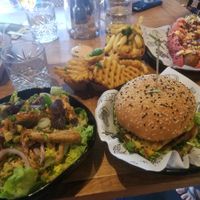 Chkn salad, VJFB burger and Pinky Bratwurst at Vegan Junk Food Bar - De Pijp in Amsterdam