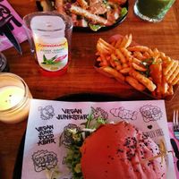 daddy mc chick'n, waffle fries & chicken caesar salad at Vegan Junk Food Bar - De Pijp in Amsterdam