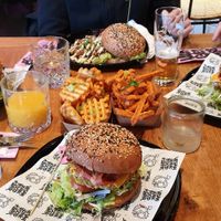 Burgers, waffle fries and sweet potato fries. at Vegan Junk Food Bar - De Pijp in Amsterdam