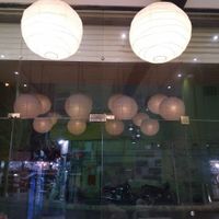 There is green simple interior at Zima Healthy Food in Isfahan