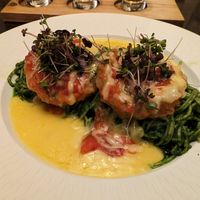 Huge serve of basil pesto with eggplant parmigiana and cheese sauce at The Porterhouse in Killarney