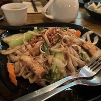 Fried noodles with tofu  at Pho District in West London