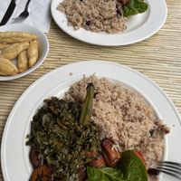 Callaloo & Okrah (spicy bean stew  on the other side) at Kool Runnings in Inverness