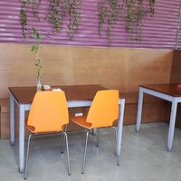 Seating for 10 plus 7 counter bar stools at Cure Cafe in Miami