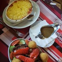 Vegan lasagna and arancine salute at Romikulum in Trier