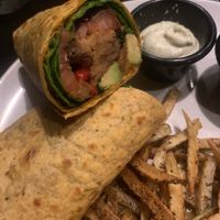 Seitan wrap & fries! Very flavorful! The wrap tortilla was really tasty as well not just regular white flour. 🖤 at No5nyc & The Vegoist in Astoria