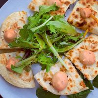 Quesadillas: vegan chicken, mushroom (fav) and mixed veggies. So delicious. Love the sauce on the top. Loaded with vegan cheese! at No5nyc & The Vegoist in Astoria