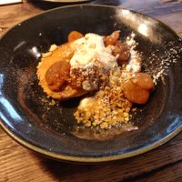 Sweet potato pancakes, dried apricot, coconut yoghurt, oat crumble and banana powder [£7.00] - Vegan at The Old Bicycle Shop in Cambridge