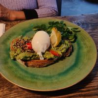 Smashed avocado, toasted sourdough, chili, lime & tomato salsa, watercress, almond dukkha [£8.50] (extra 1.00 for poached egg) - Vegetarian at The Old Bicycle Shop in Cambridge