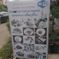 Vegetarian written on the front board at Lisa's Cafe in Savannakhet