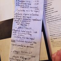 Daily menu including clearly marked vegan options at Cafe Bar 67 in Athens