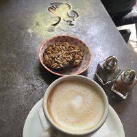 Vegan cappuccino and a vegan snack at Cafe Bar 67 in Athens