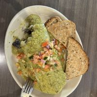 Breakfast burrito made vegan. The toast is not included that was from my wife’s meal.  at Snooze - Larimer St in Denver