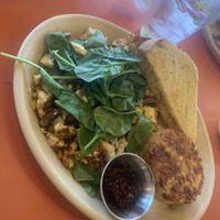 Tofu scramble + fresh spinach (don’t eat the toast, not vegan)  at Snooze - Larimer St in Denver