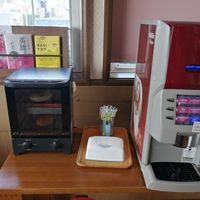 Free coffee! Be careful if you are vegan, they use cow milk for the cafe latte and milk tea. at Prema Bakery in Komaki